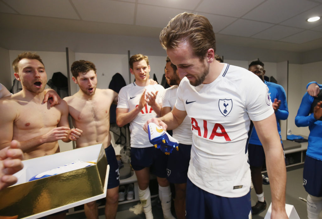 LIVERPOOL, ENGLAND - FEBRUARY 04:  (EXCLUSIVE COVERAGE) Harry Kane of Tottenham Hotspur is presented with a pair of celebratory Nike boots in the dressing room after the Premier League match between Liverpool and Tottenham Hotspur at Anfield on February 4, 2018 in Liverpool, England.  (Photo by Tottenham Hotspur FC/Tottenham Hotspur FC via Getty Images)