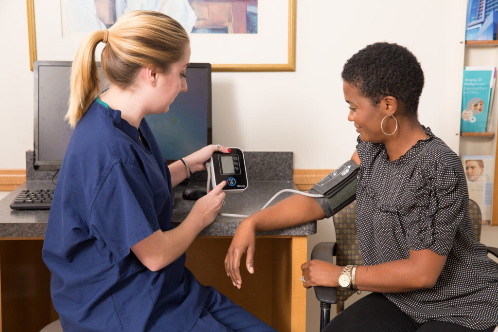 An accurate reading is essential to detect high blood pressure. This photo shows optimal procedures, including the supported arm, no clothing on the arm and uncrossed legs. The American Heart Association.