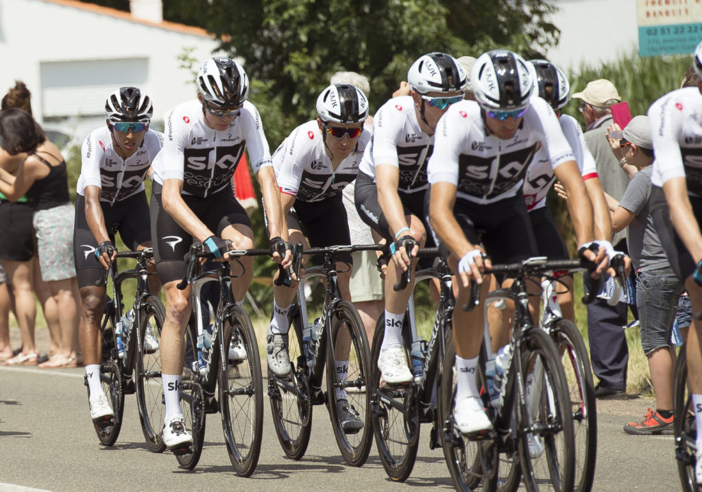 Tour de France Team Sky's Chris Froome (second left) and Geraint Thomas (centre) ride with team-mates during stage one of the Tour de France.