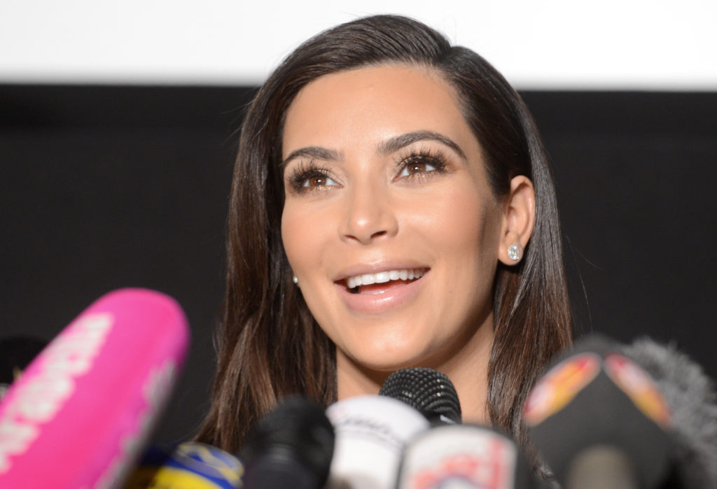 US television personality Kim Kardashian speaks during a press conference in Lugners 'Lugner City' in Vienna, Austria, 27 February 2014. Kim Kardashian will accompany Austrian entrepreneur Richard Lugner as his special guest to the Vienna Opera Ball.