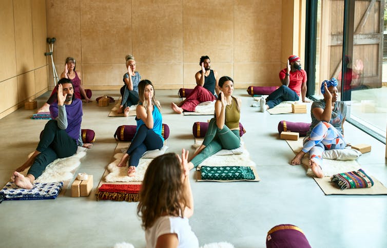 Yoga mixes physical exercise with meditation and breathing techniques. 10,000 Hours/Digital Vision via Getty Images